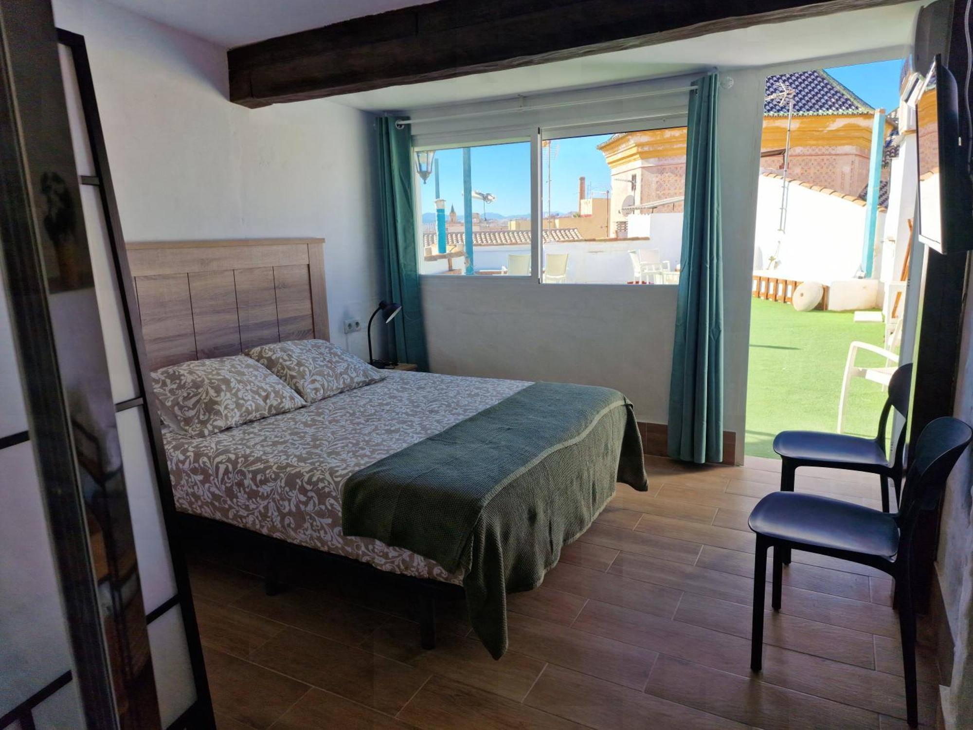 Hotel Boutique Nomadas Málaga Oda fotoğraf